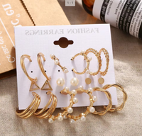 Femmes mode surdimensionné métal cercle coeur Punk boucles d'oreilles ensemble torsadé grande perle avec coquille pierre bijoux en gros