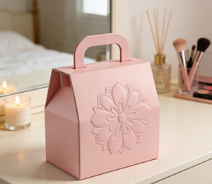 <b>Pink</b> embossed cardboard <b>gift</b> <b>box</b> with handle, featuring integrated handle design -Vietnam FSC Certified Luxury Packaging Factory - Product Image 1