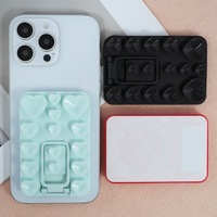 Support de téléphone pliable en silicone en forme de cœur à double ventouse avec autocollant adhésif pour la gym, le miroir, la salle de bain et le bureau