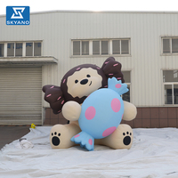 Modèle de chien gonflable personnalisé en forme de bonbon, style dessin animé, pour la publicité et la décoration d'événements en centres commerciaux et sur le marché en plein air