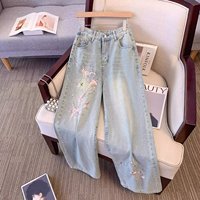 Jeans à jambes larges pour femmes, style chinois, broderie florale, denim délavé, taille haute, coupe ample, pantalon décontracté rétro