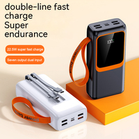 Batterie externe haute capacité pour cadeaux électroniques, 10000-50000 mAh, avec lumière LED, grande fenêtre, câble intégré, charge rapide et cordon de transport