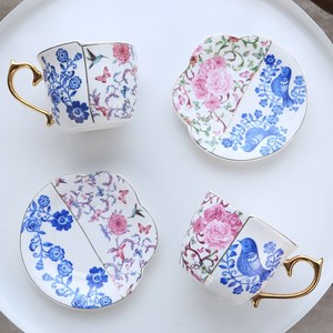 Juego de Taza y Platillo de Café de Cerámica Vintage Europea - Diseño de Pájaro y Flor con Detalles en Oro - Product Image 1