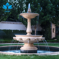 Grande fontaine d'eau classique à plusieurs niveaux en pierre pour jardin extérieur avec sculpture sculptée sur mesure pour la décoration de plaza, de jardin et de projets emblématiques