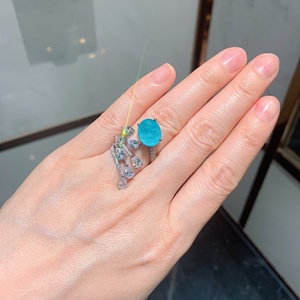 Bague de luxe pour femme en pierre bleue Paraiba, incrustée de <span class=keywords><strong>cuivre</strong></span> et de zircone cubique, avec motif multi-couches, coupe ovale, bijou de déclaration pour soirée - Product Image 4