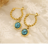 Boucles d'oreilles torsadées en acier inoxydable les plus vendues avec pendentif rond pour femmes