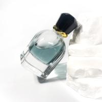 Nouvelle conception de flacon de parfum en verre transparent de 75 ml avec pompe pulvérisatrice, atomiseur, emballage en verre, flacon de parfum vide avec boîte