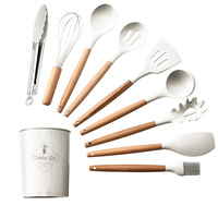 Offre Spéciale de haute qualité 11 pièces accessoires de cuisine en silicone outils de cuisson ensembles d'ustensiles de spatule de cuisine avec manche en bois