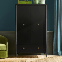 Armoire noire à deux portes avec tiroir large, quincaillerie dorée et pieds effilés, meuble de rangement autoportant pour vêtements de chambre