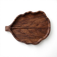 Plateau de service en bois au design botanique unique, plateau en bois de mangue foncé avec forme de feuille et tige sculptée