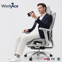 Chaise de bureau ergonomique industrielle en maille avec appui-tête, support lombaire, repose-pieds rétractable et réglable en hauteur pour le bureau à domicile (vente en gros)