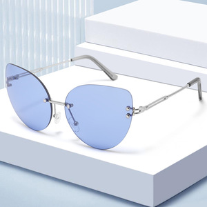 Elegantes Gafas de Sol Cat Eye sin Montura, Lentes de PC con Protección UV400, Marco de Metal, para Mujer, a la Moda, Protección Solar, Estilo Viaje, Color Negro - Product Image 4