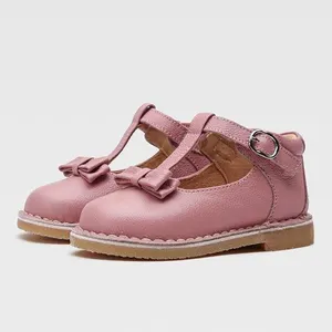 Розовая текстурированная кожаная обувь на резиновой подошве с бантом для девочек