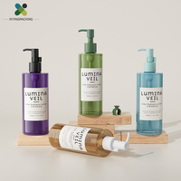 Nouvelle mode de bouteilles de pompe à huile cosmétiques en plastique PET de luxe de haute qualité de 250ml 300ml pour contenir l'huile essentielle de soins de la peau
