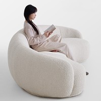 Canapé modulable incurvé de forme organique - Canapé en tissu velours Teddy style crème français - Meuble de salon minimaliste irrégulier