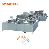 Machine d'assemblage d'aiguilles de seringues hypodermiques pour l'industrie médicale