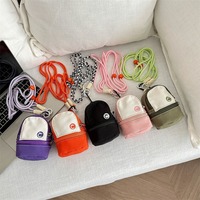 Nylon pièces sacs cartable sac à main Mini porte-clés pendentif Portable garçons et filles casque documents sacs de rangement