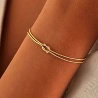 Bracelet cadeau pour la Saint-Valentin, bracelet en acier inoxydable fait main, ultra fin, chaîne serpent ronde, bracelet nœud d'amour infini pour les couples