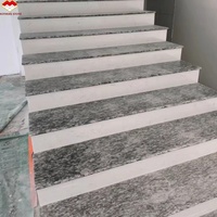 Grande dalle de granit gris poli effet vague de mer, design moderne de luxe, écologique, pour cuisine et salon