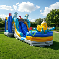 Toboggan aquatique gonflable double piste avec château gonflable et piscine à jets d'eau pour location commerciale et événements