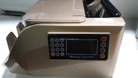 Petit machine à compter ses billets de banque, pour compter l'argent, 690