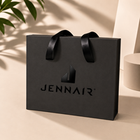 Boîte cadeau en papier rigide noir mat avec poignée en ruban pour emballage de marque haut de gamme, vente en gros