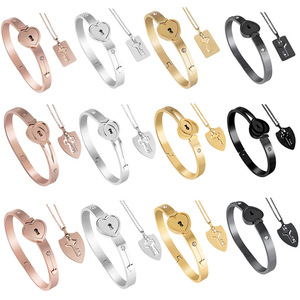 Conjunto de pulsera y collar con colgante y brazaletes de corazón con llave y cerradura de acero inoxidable | Conjunto de joyería desbloqueable para parejas de amantes para hombres y mujeres - Product Image 2