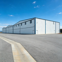 Hangar para Aviones Prefabricado Personalizado con Puerta Corredera Ancha, Interior Transparente, Certificado EN1090