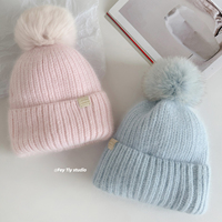 YANIBEST Bonnet d'hiver pour femme, doublure en satin, tricot jacquard, respirant et imperméable, chaud et doux, bonnet de ski avec pompon beige