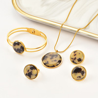 Ensemble en acier inoxydable pour femme, style vintage léopard : collier, bracelet, boucles d'oreilles et bague en acier titane