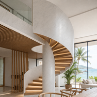 Escalier en colimaçon intérieur sur mesure pour villa haut de gamme avec balustrade décorative et structure d'ingénierie de précision