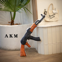 Vente en gros de jouets en peluche personnalisés, jouets en peluche doux, jouets en peluche en forme de pistolet pour garçons, enfants, coussin en forme de pistolet de simulation