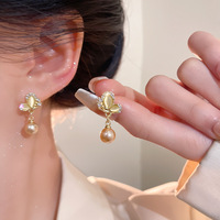 Boucles d'oreilles pendantes RINHOO tendance, ailes de papillon, imitation perle champagne, strass exquis, bijoux mignons pour soirée
