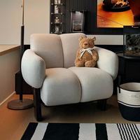 Canapé simple moderne et confortable en tissu et bois massif, fauteuil individuel adapté aux salons, hôtels et appartements