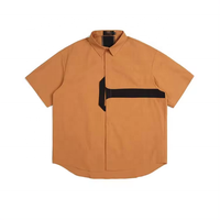Chemises de travail pour hommes à col montant, manches courtes, coupe ample, boutonnées, style décontracté, motif uni brodé, tissu tricoté