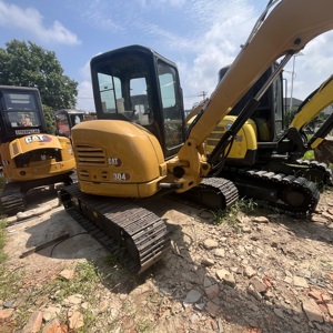Pelle compacte CAT 304 d'occasion haute performance avec attache rapide et godet en acier allié, provenant de la flotte de machines légères - Product Image 2