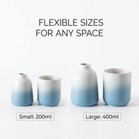 Ensemble de pots à bougies en céramique bleu dégradé de qualité supérieure et de bouteilles d'aromathérapie, vase diffuseur d'arômes en porcelaine mate avec logo personnalisé