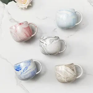 高品质批发定制廉价圆形心形陶瓷杯异形手柄在中国制造