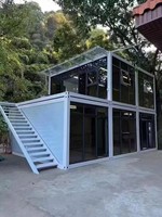 FMX Conteneur modulaire de style chinois pour la maison Conteneur d'expédition en acier et panneau sandwich avec puits de lumière et fenêtres Utilisation à domicile