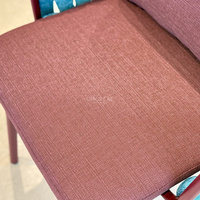 Chaise de jardin en métal avec accoudoirs en corde tressée et coussins pour terrasse extérieure