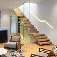 Escalier flottant au design moderne de luxe, avec éclairage LED à détecteur de mouvement, marches en verre sans cadre, marches en bois massif, matériaux en métal, Canada/USA