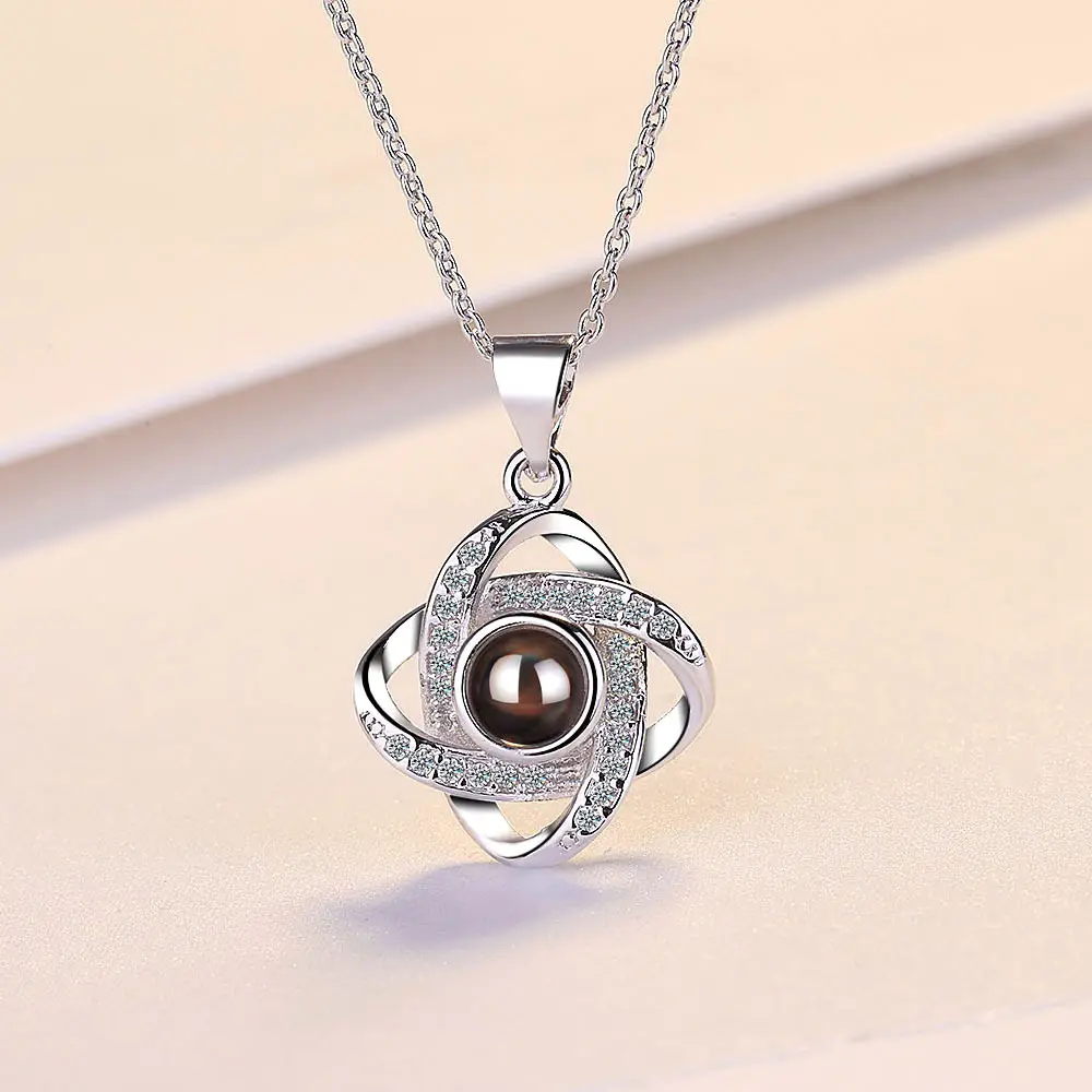 Nouvel arrivage collier pendentif de Projection en argent Sterling 925 cristal trèfle à quatre feuilles bijoux rotatifs en argent pur pour femmes