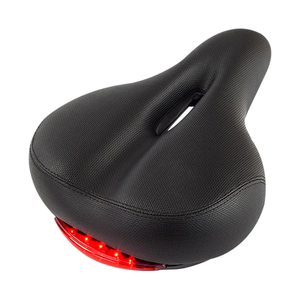 Sillín de <span class=keywords><strong>bicicleta</strong></span> de <span class=keywords><strong>gel</strong></span> suave y cuero con luz trasera, estilo de movimiento de carbono para ciclismo de montaña, suministro de fabricantes - Product Image 1