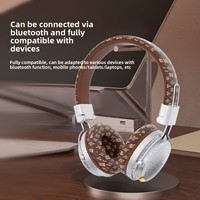 AKZ-606 Nouveau modèle exclusif transfrontalier d'écouteurs sans fil circum-auriculaires Bluetooth 5.4, pliables, avec fente pour carte et serre-tête à motifs