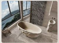 Baignoire ovale autoportante en pierre artificielle moderne avec surface inférieure antidérapante pour salle de bain dans les petits appartements