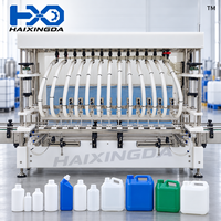 Machine de remplissage automatique de liquides chimiques par gravité à 12 buses en ligne pour bouteilles, idéale pour les acides, les eaux de Javel et les systèmes de nettoyage industriels