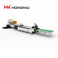Système de découpe laser à fibre CNC de qualité industrielle avec dérouleur hydraulique robuste et manipulation automatique des matériaux