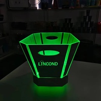 Nouveau design de seau à glace lumineux LED en plastique acrylique de luxe avec capacité de 8L pour le refroidissement du champagne et des boissons pour les fêtes