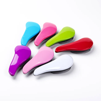 Brosse à cheveux démêlante antistatique en nylon et plastique avec coussin de ventilation, manche magique ionique et logo personnalisé