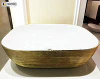 WC en céramique sanitaire de luxe en porcelaine chinoise à texture brossée dorée 3D, suspendu au mur, pour hôtel, villa